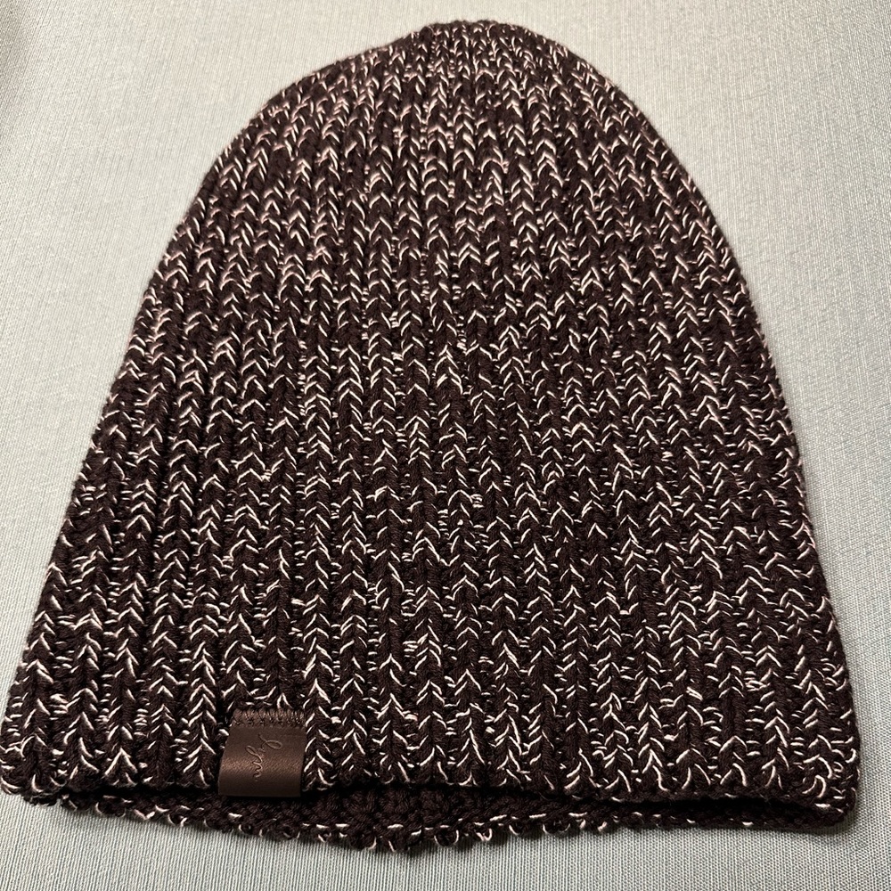 Black and white Love Your Melon reversible beanie.